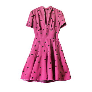 pink dress with black dots